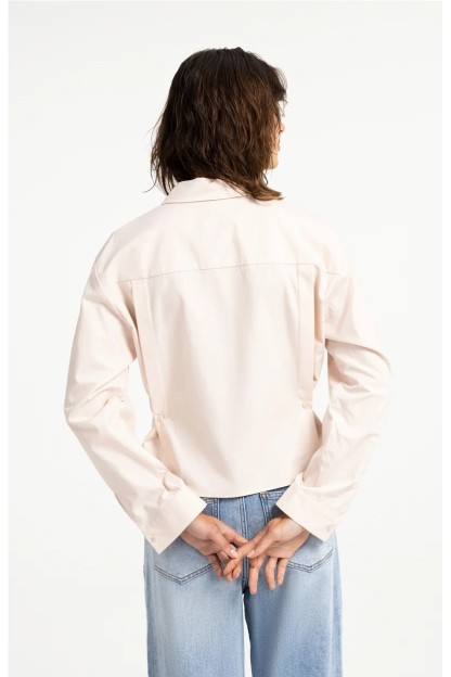 blusa de popelina con cintura ajustable y mangas largas rosa melocoton