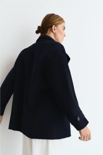 chaqueta ese o ese azul marino botones cruzados y cuello subido