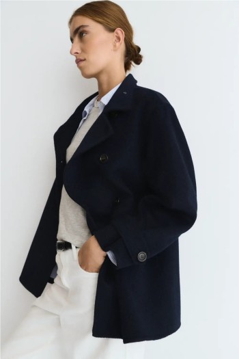 chaqueta ese o ese azul marino botones cruzados y cuello subido