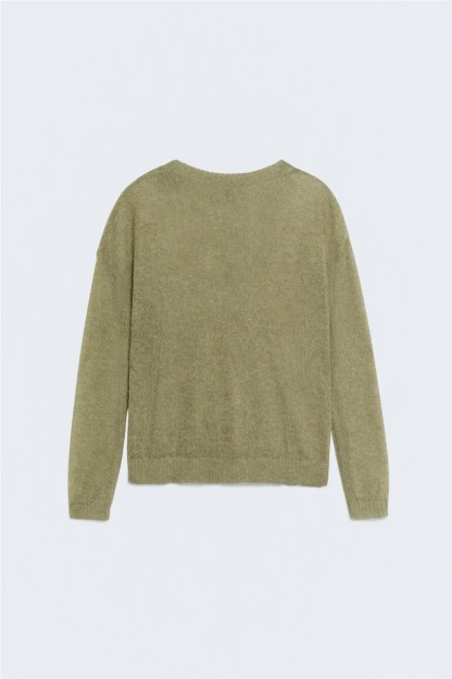 Jersey de galga media. Con composición de lana. Tejido ligeramente tra