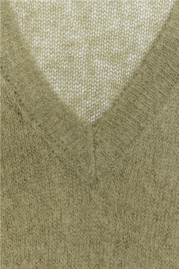 Jersey de galga media. Con composición de lana. Tejido ligeramente tra