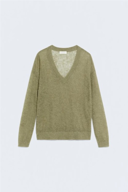 Jersey de galga media. Con composición de lana. Tejido ligeramente tra