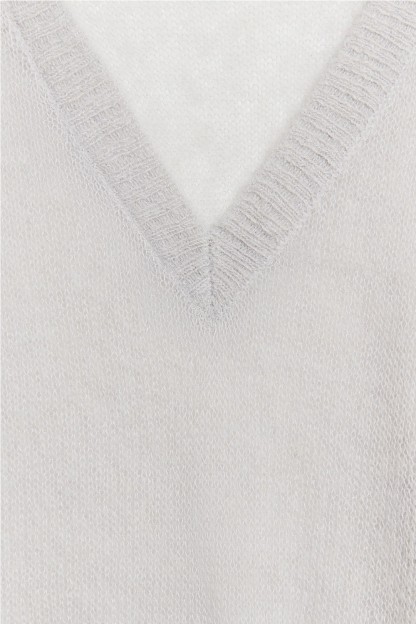 Jersey de galga media. Con composición de lana. Tejido ligeramente tra